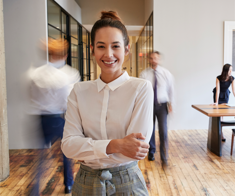 Image A happy young working female consulting professional that could mimic a TalentSmartEQ employee